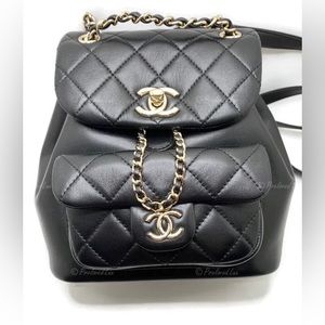 Authentic CHANEL Black lambskin Mini Duma Drawstring Backpack / Gold Hardware